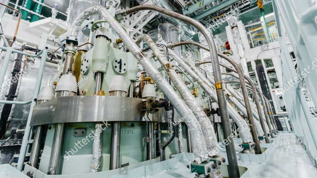 stock photo high angle interior view of a massive marine diesel engine inside a ship engine room with complex 2758943541